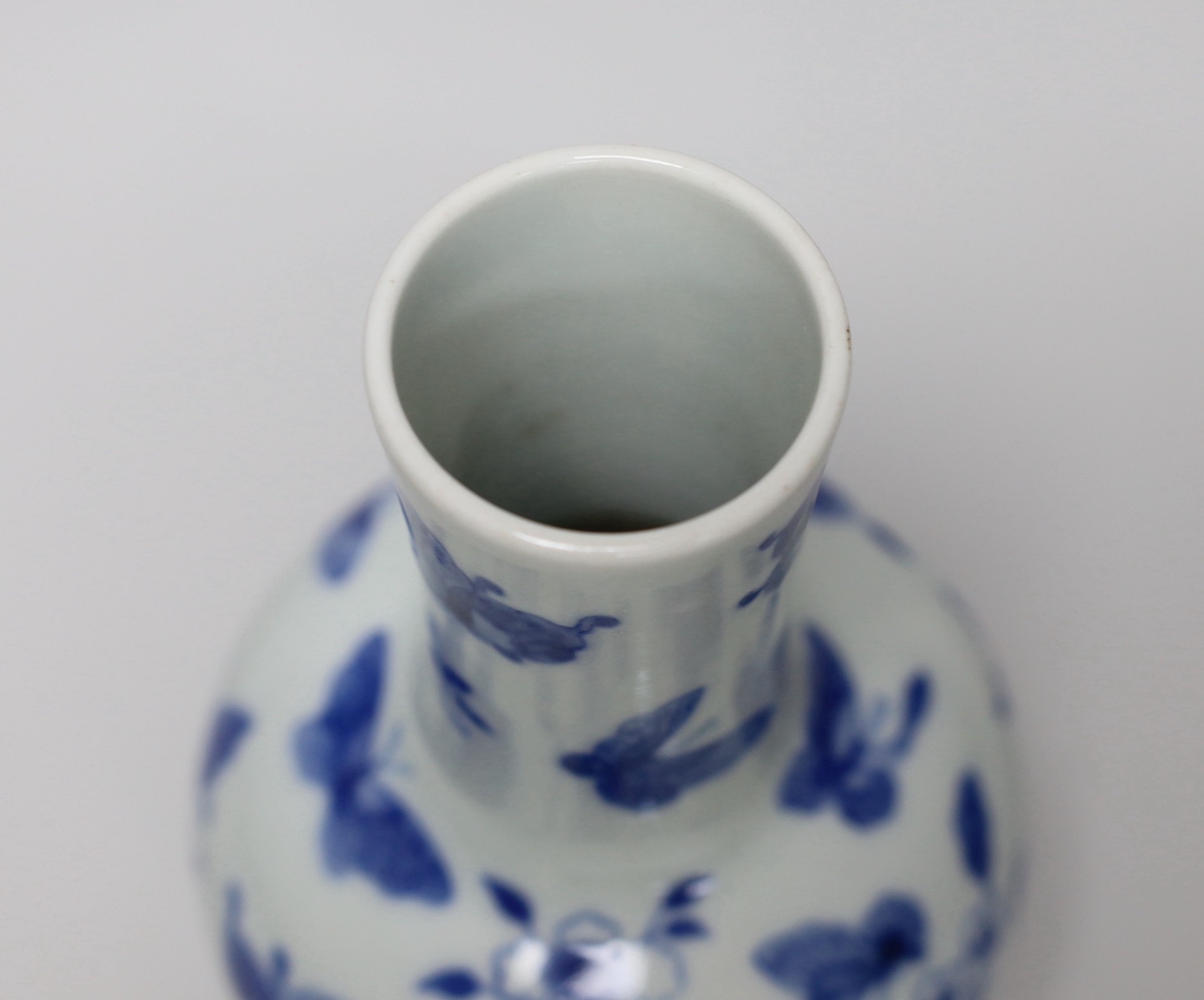 A Chinese blue and white ‘butterfly’ vase, 19cm